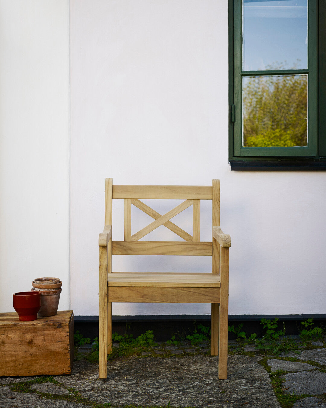 Durable teak patio chair
