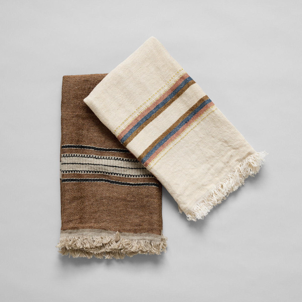 Neutral linen towels folded neatly for versatile home use