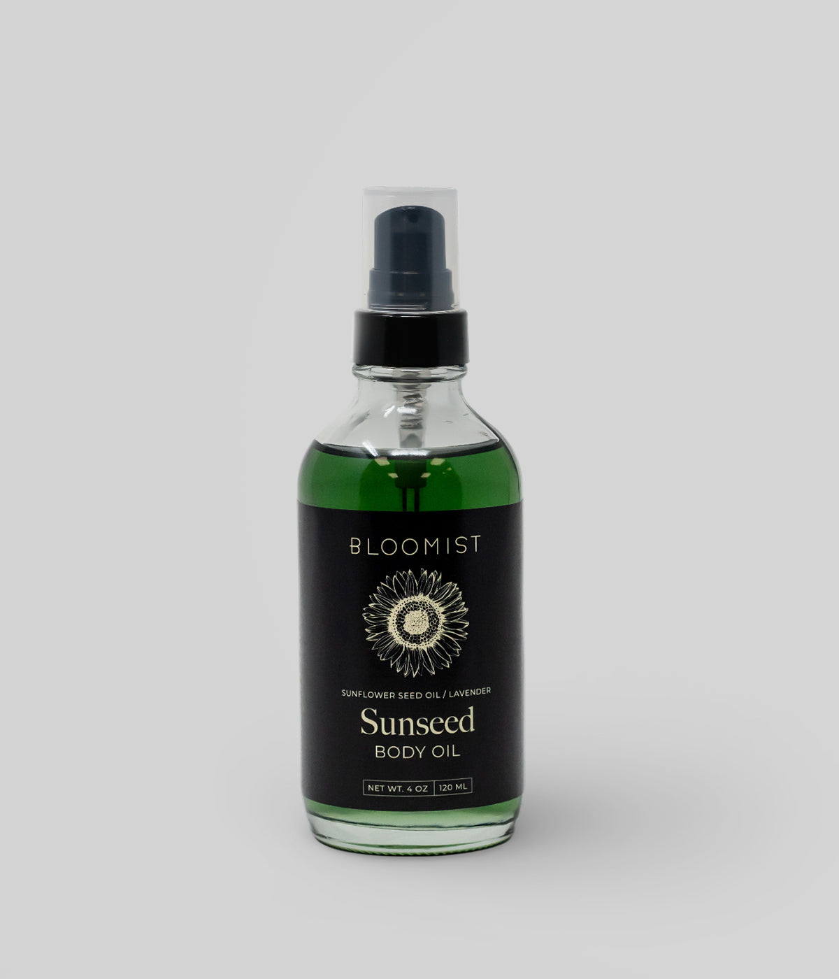 Bloomist sunflower body oil in a green glass pump bottle