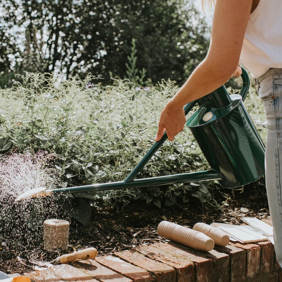 Beautiful watering can by Haws with rich green finish and handcrafted English design