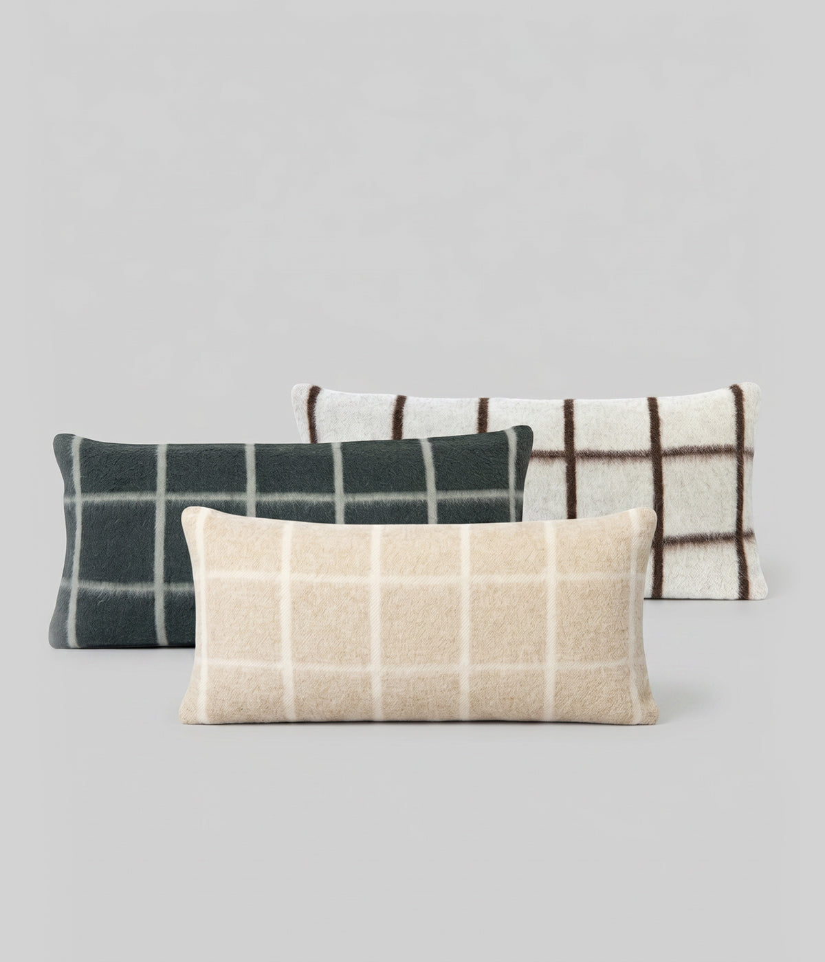 Umi neutral lumbar pillow in superfine alpaca with bold windowpane grid