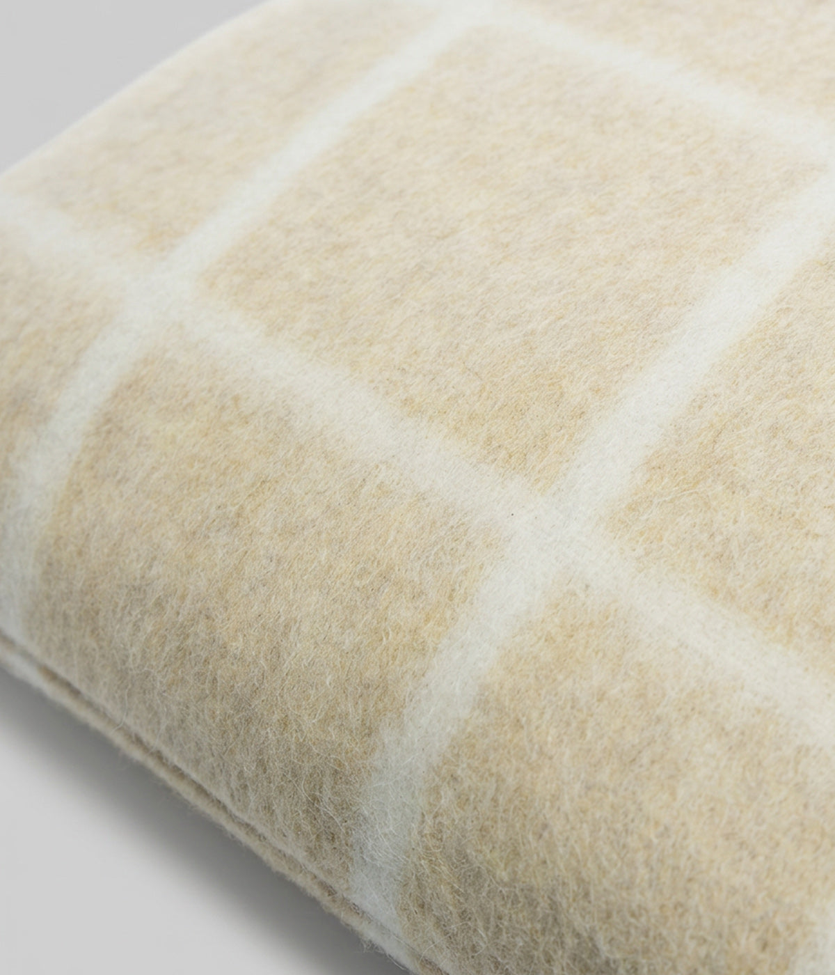 Umi pillow Limestone Melange showing slightly varied melange ground surface