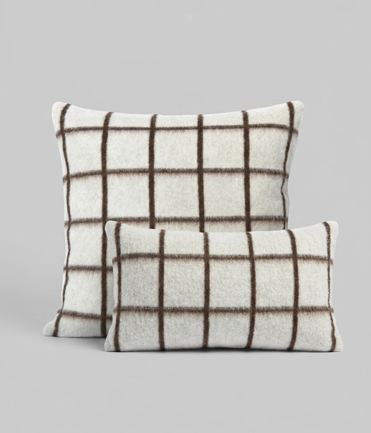 Umi square and lumbar pillows in coffee and ivory