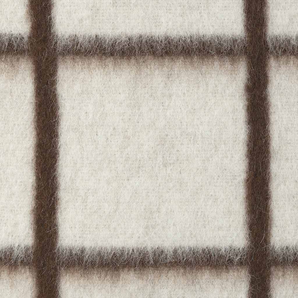 Umi pillow Ivory Coffee showing zero dye naturally colored fiber tones