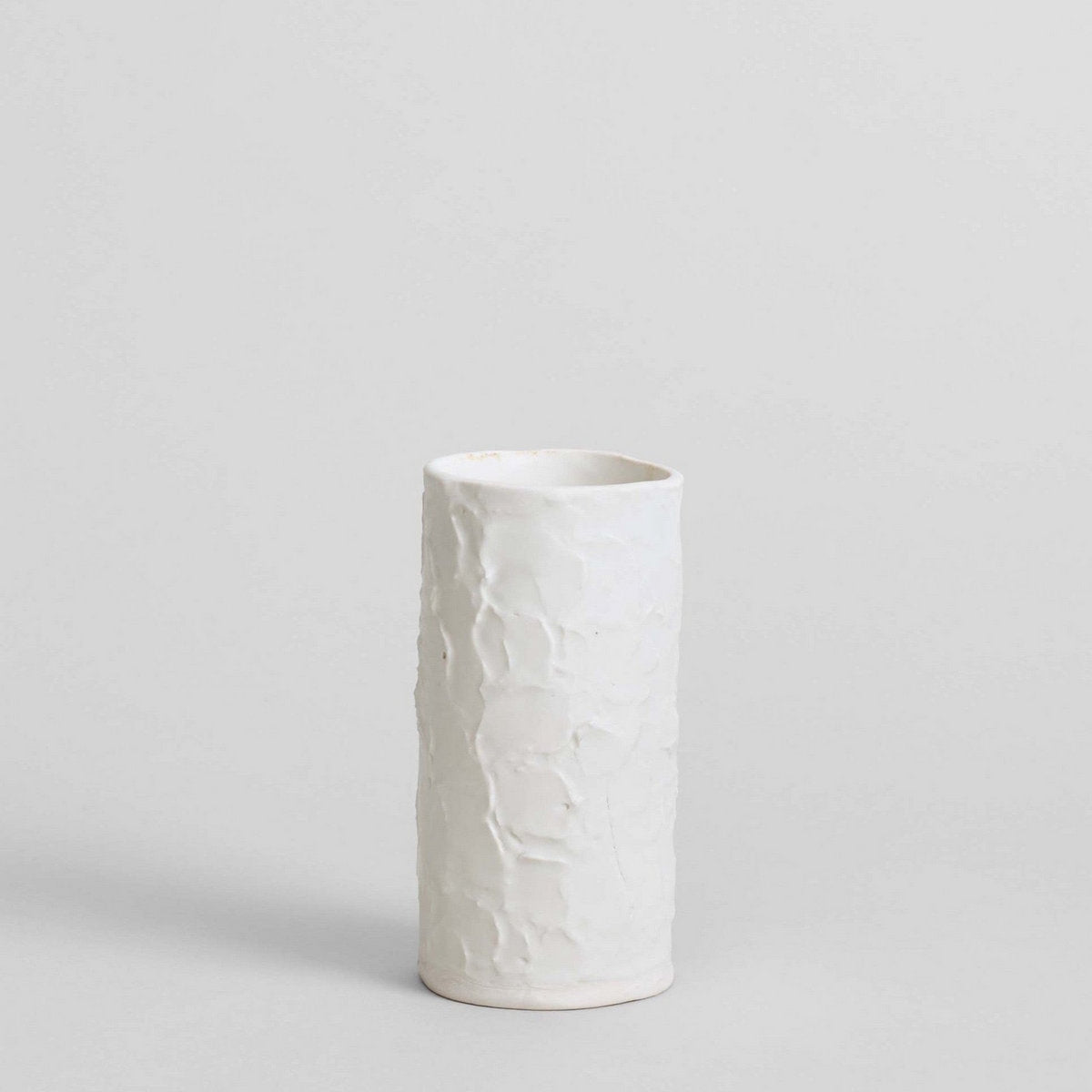 Porcelain vase with textured white finish for fresh and dried flowers