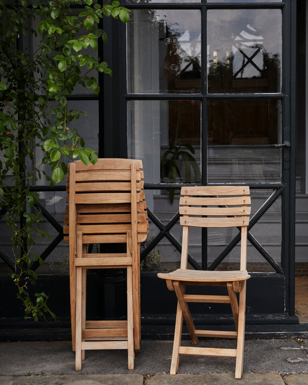 Comfortable teak patio chair
