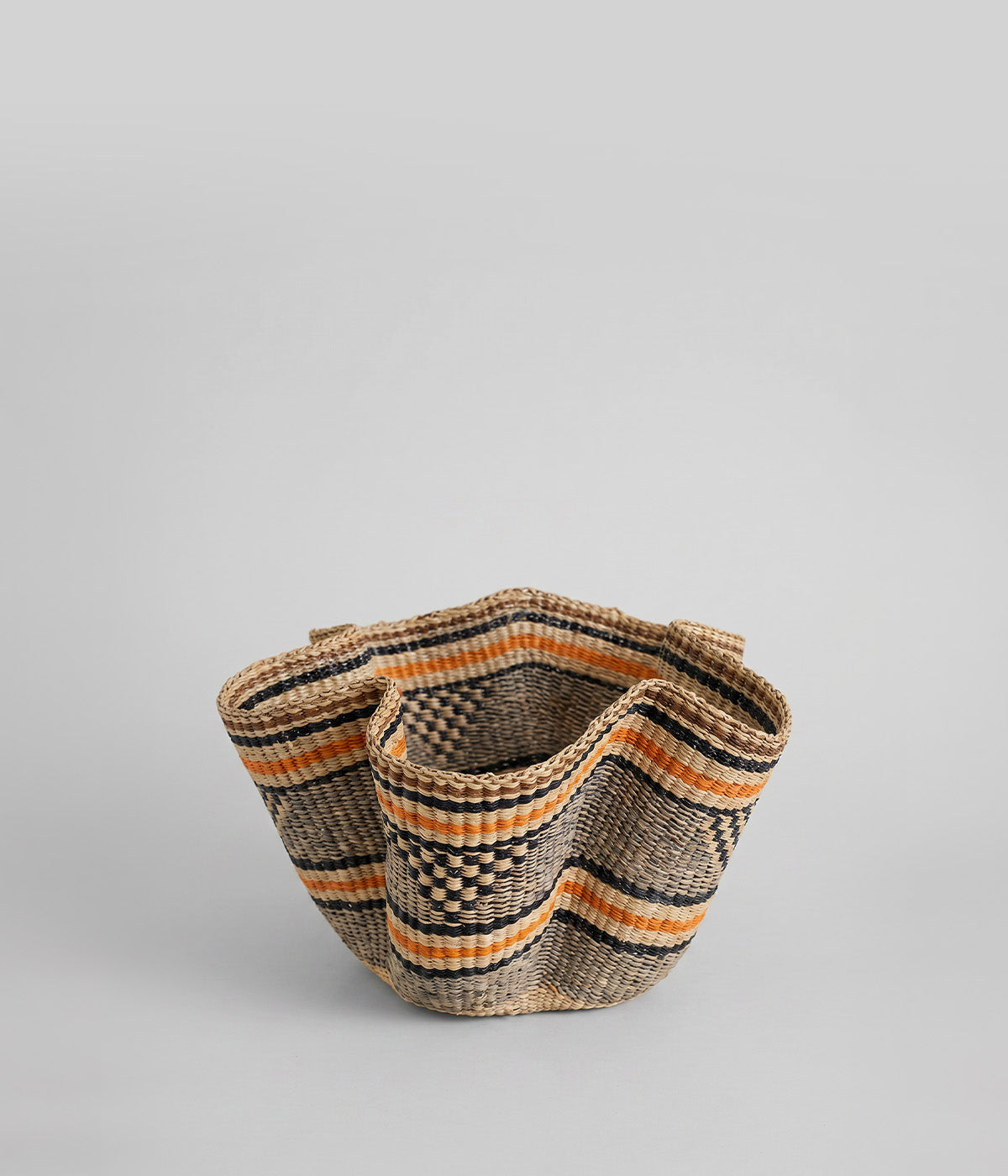 Handwoven African baskets with wave pattern in elephant grass