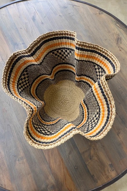 Elephant grass basket with black, brown, and burnt orange bands