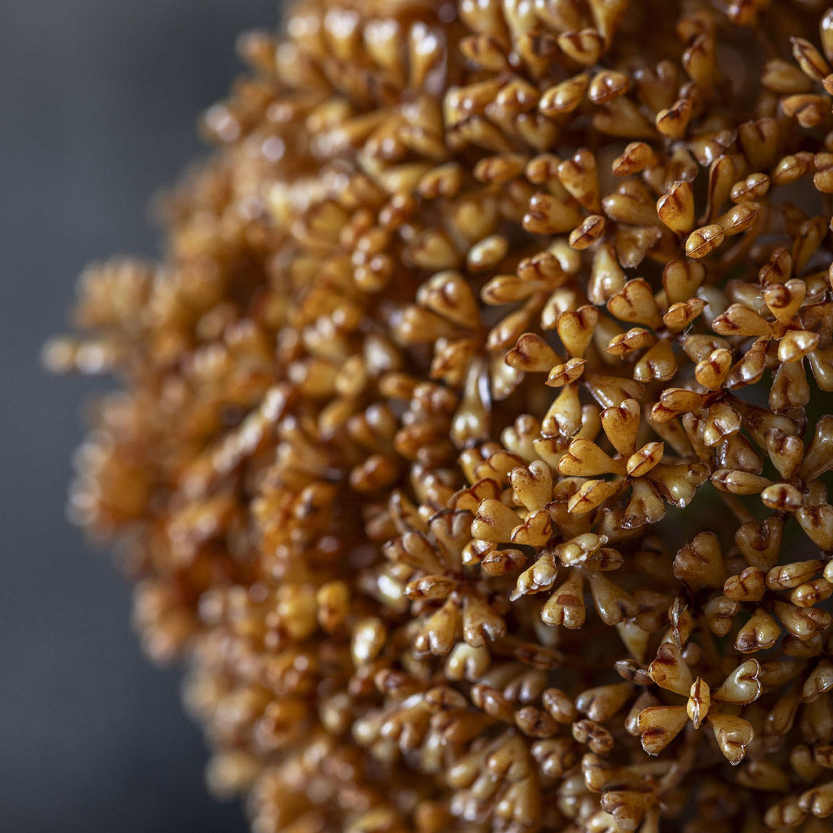 Lifelike faux botanical stem with clustered umber bloom for floral arrangements