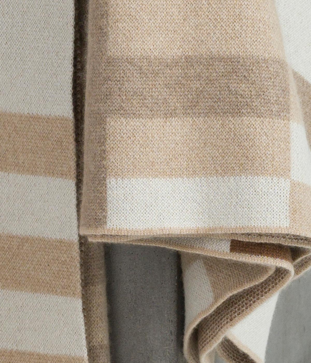 Ethically sourced cashmere throw with a minimalist Bauhaus pattern