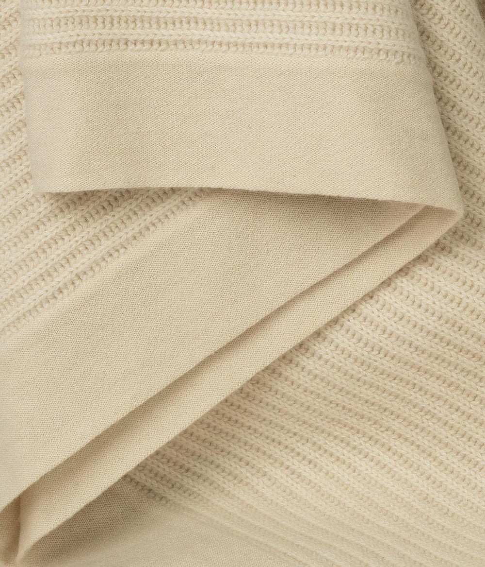 Cream Cashmere Knit Throw, handwoven with traditional techniques for lasting softness