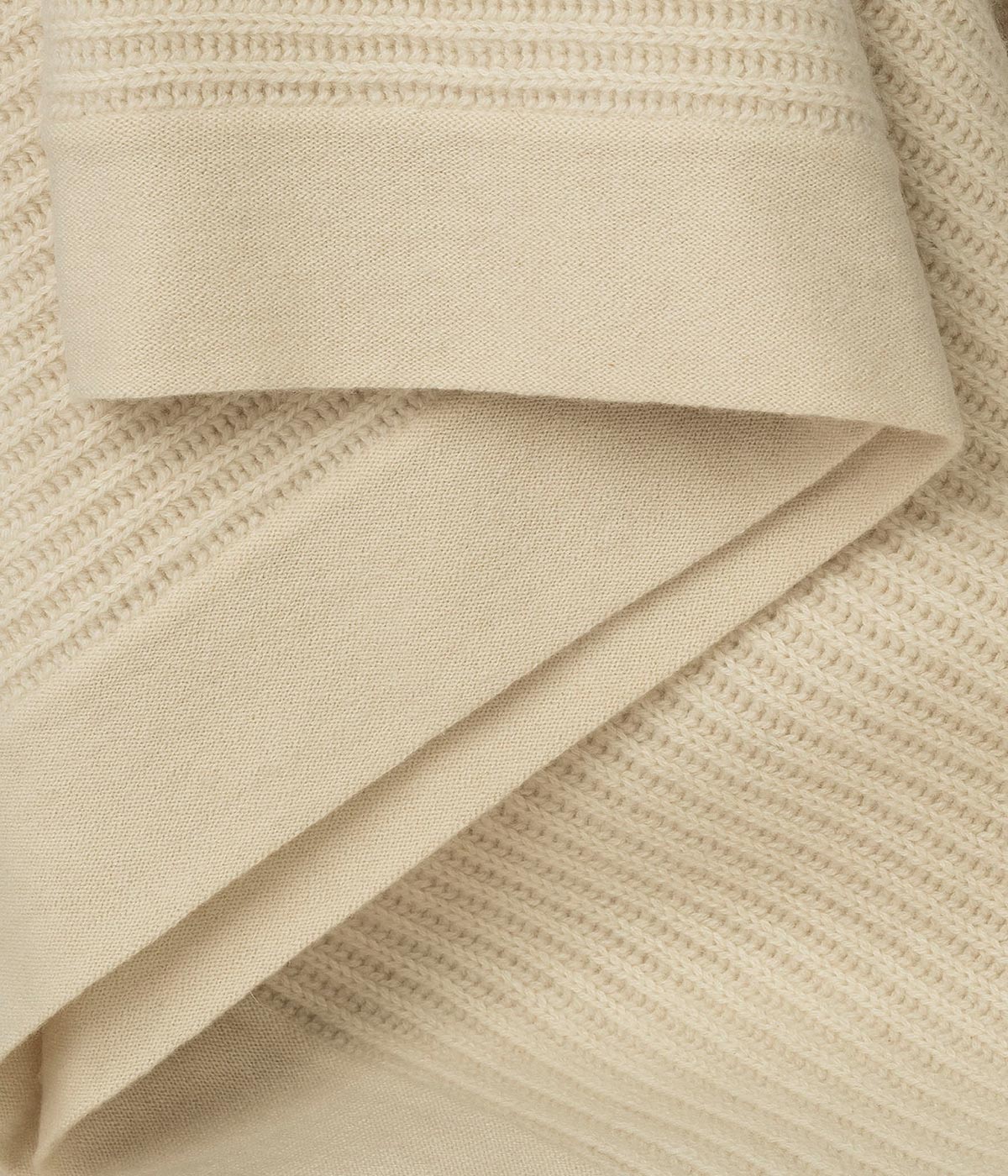 Cream Cashmere Knit Throw, handwoven with traditional techniques for lasting softness