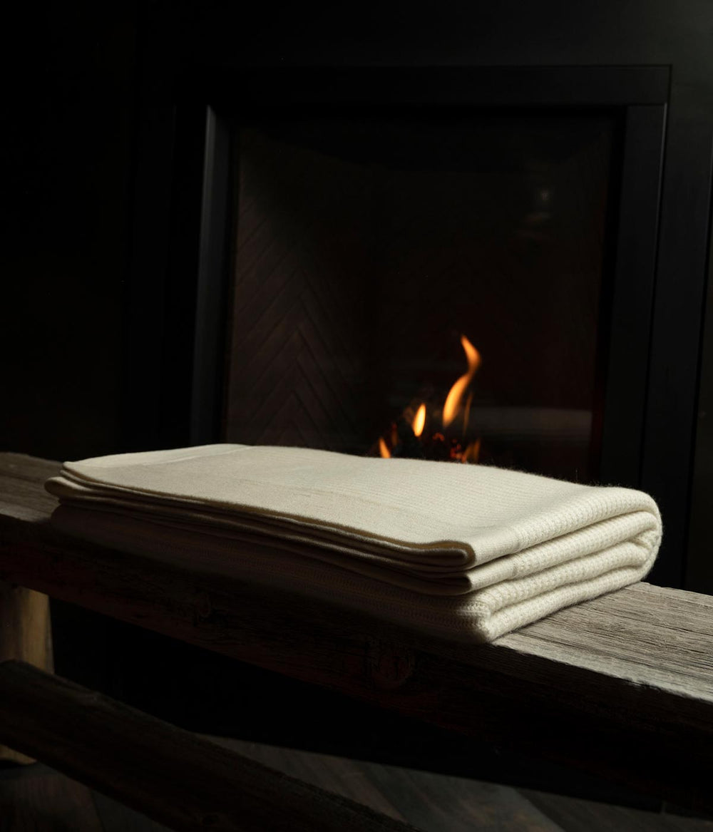 Mongolian Cashmere Throw in cream, a sophisticated and cozy accent for any space