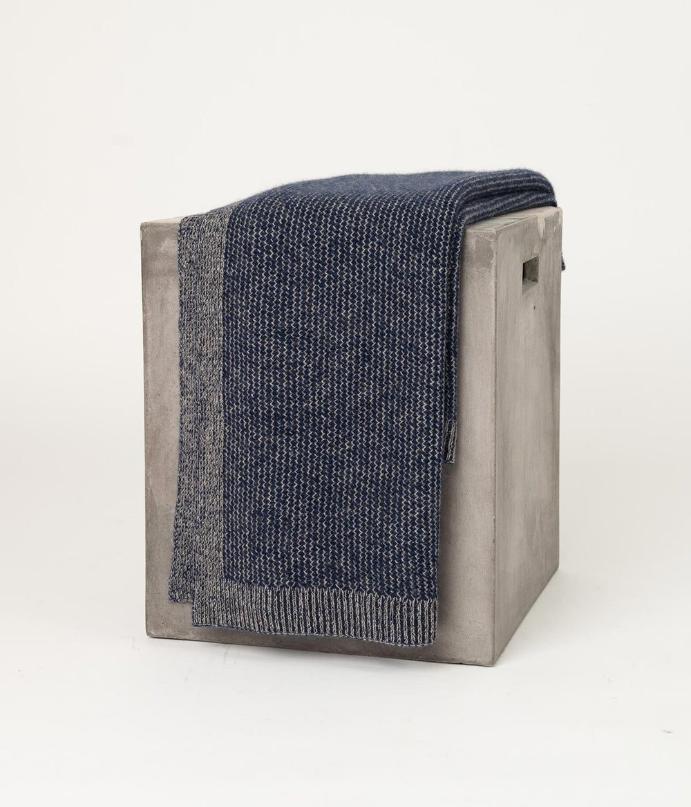 Luxuriously soft and hypoallergenic throw blanket made from hand-combed yak down