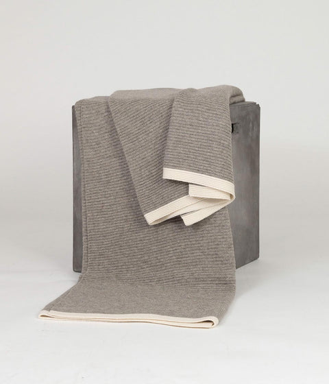 Handwoven platinum and white knit  throw blanket made from yak down with soft cashmere borders