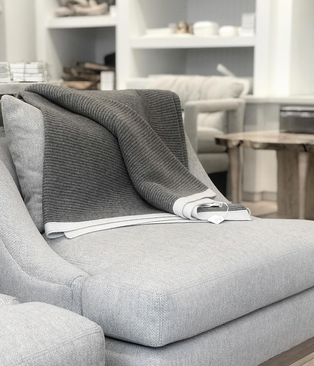 Knit yak down blanket draped over a chair for a simple yet luxurious touch