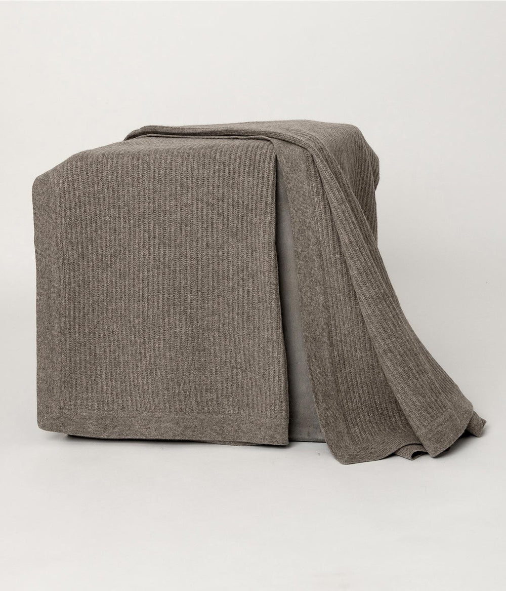 Elegant yak down throw blanket ideal for cozying up on a sofa or adding charm to your home