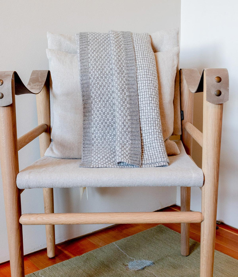 Best Cashmere and Yak Throw Blanket elegantly draped over a chair