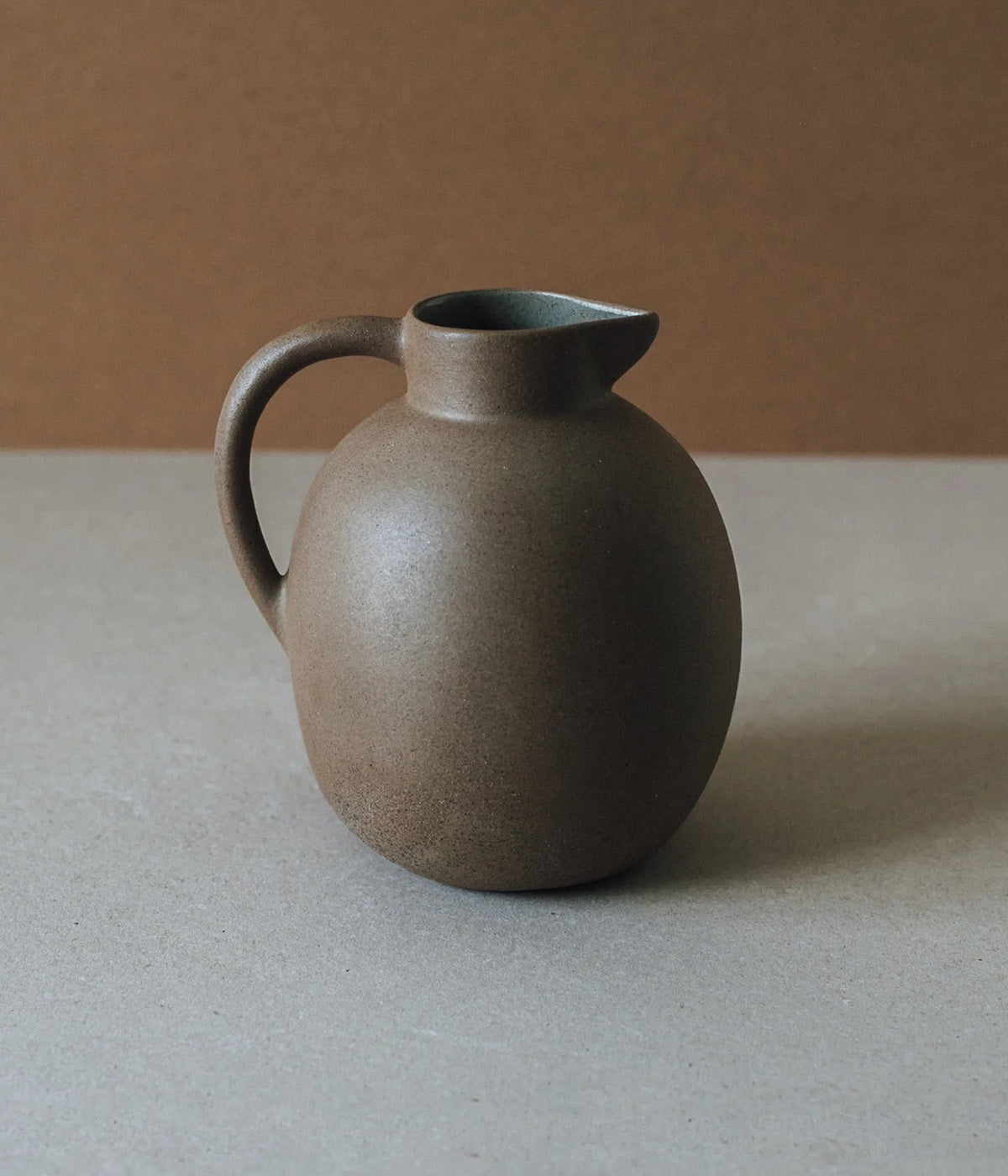 brown ceramic vase for flowers or table serving