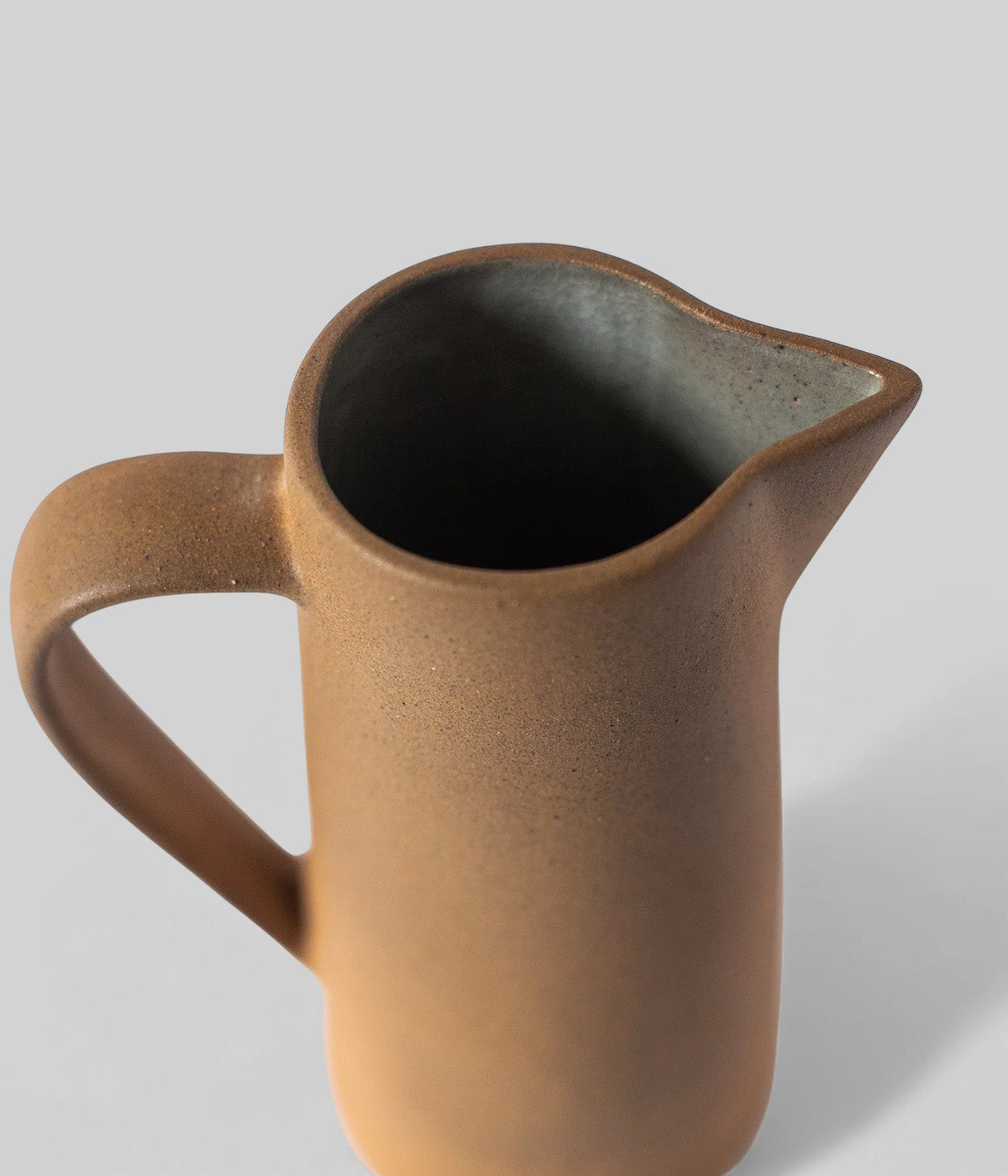 ceramic water pitcher used as a decor or a vase for florals