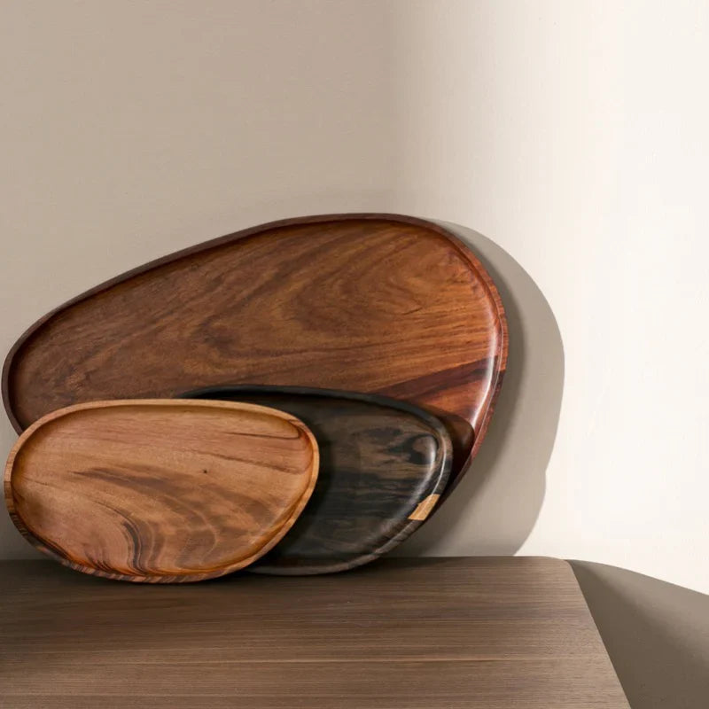 Unique wooden serving tray with asymmetrical edges ideal for snacks and decor