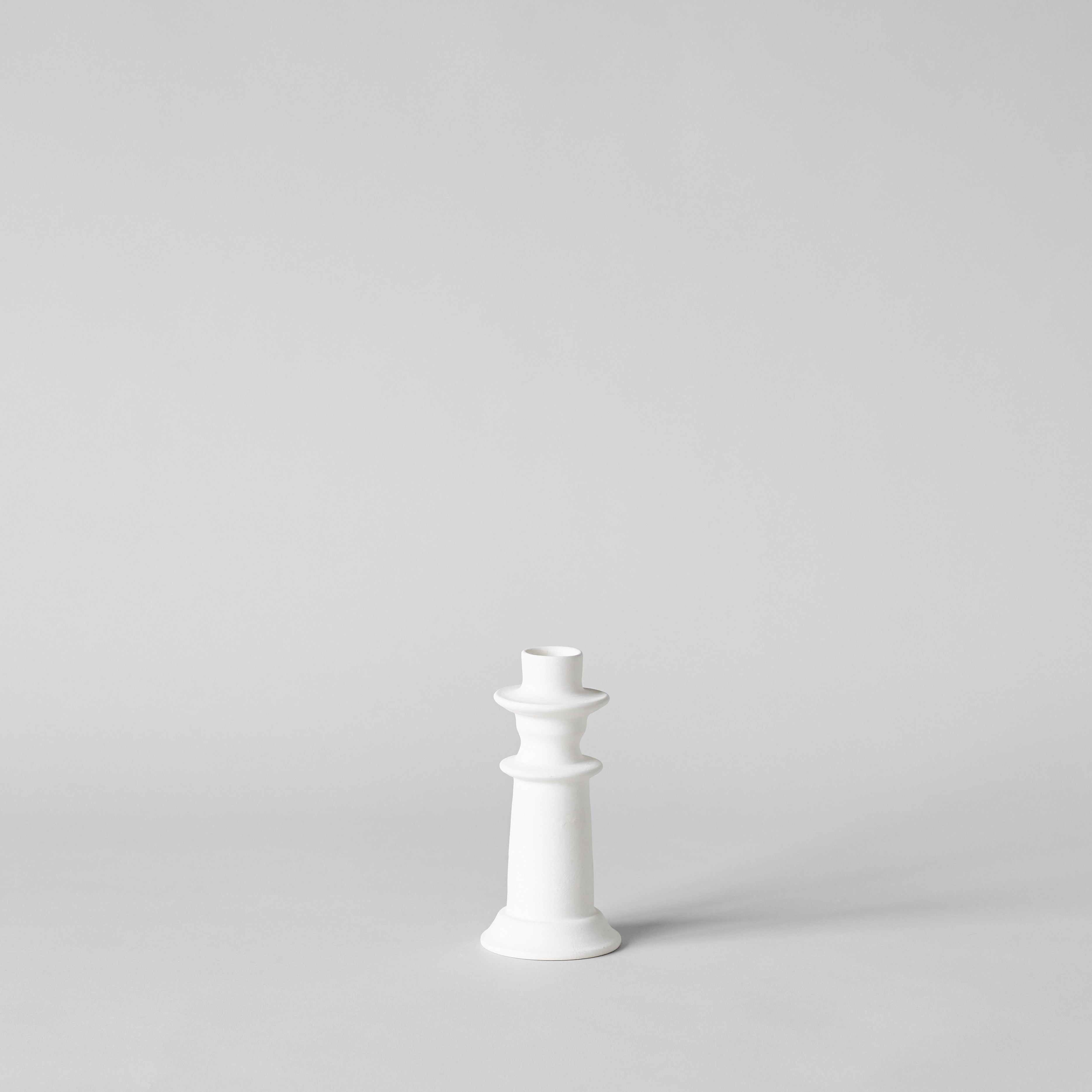 Small Moroccan ceramic candlestick with matte raw clay surface
