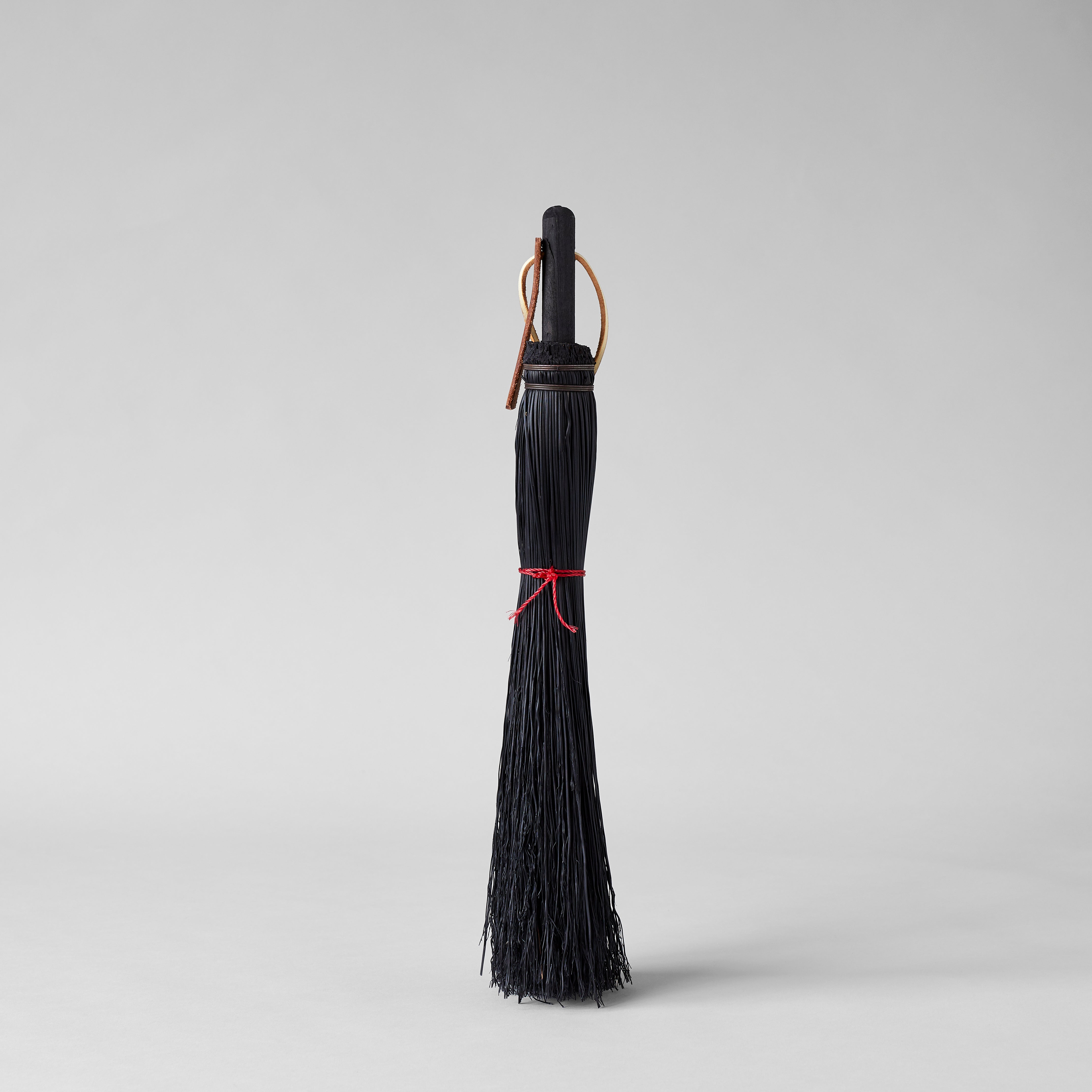 Small broom with wood handle for fireplace and household cleaning