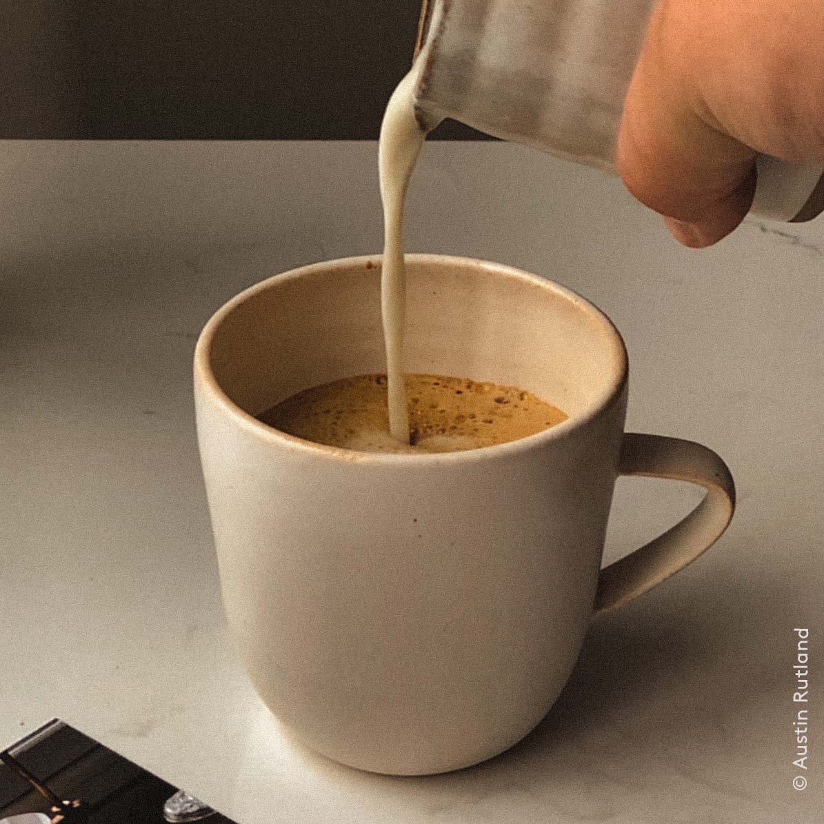 Stoneware coffee mug with custom glaze finish